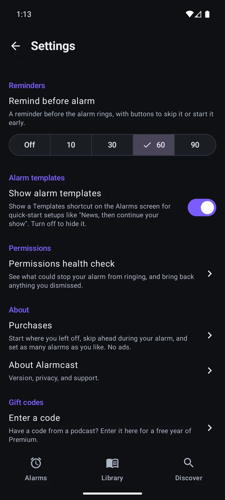 Alarmcast Settings, scrolled to the bottom: a Gift codes section with the row Enter a code